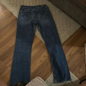 Women’s buckle jeans